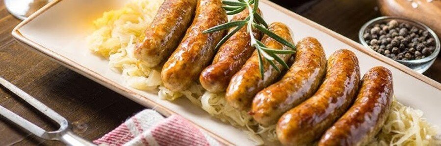 German sausages served with sauerkraut on a Rhine River cruise highlighting regional cuisine