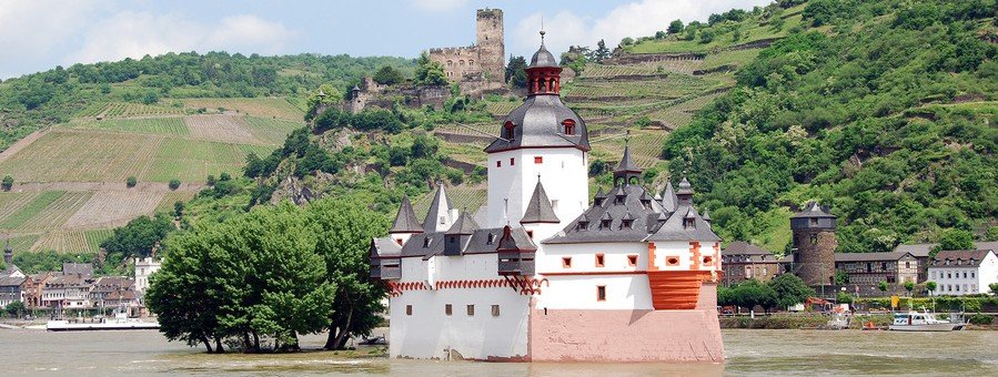 Pfalzgrafenstein Castle on an island in the Rhine Gorge with vineyards and hills in the Upper Middle Rhine Valley Germany